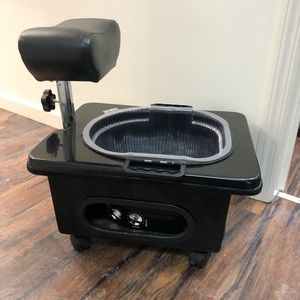 Pedicure bowl and foot rest.